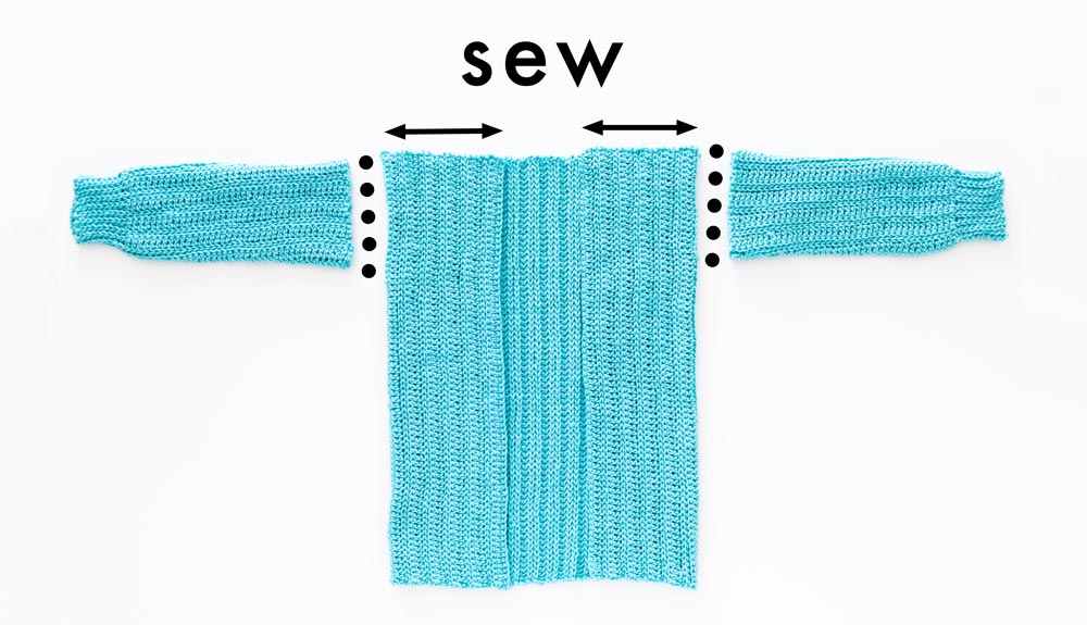 assembly flat lay of crochet cardigan body panel and sleeves