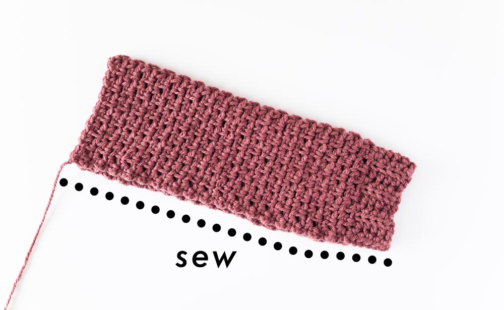 sew edges of chunky crochet sleeve together